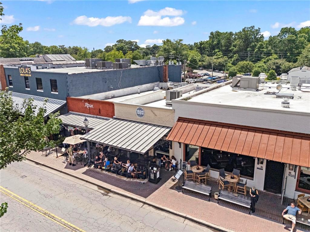 53 Maple Street Roswell, GA 30075 - Photo 51 of 59 a view of a terrace with sitting area