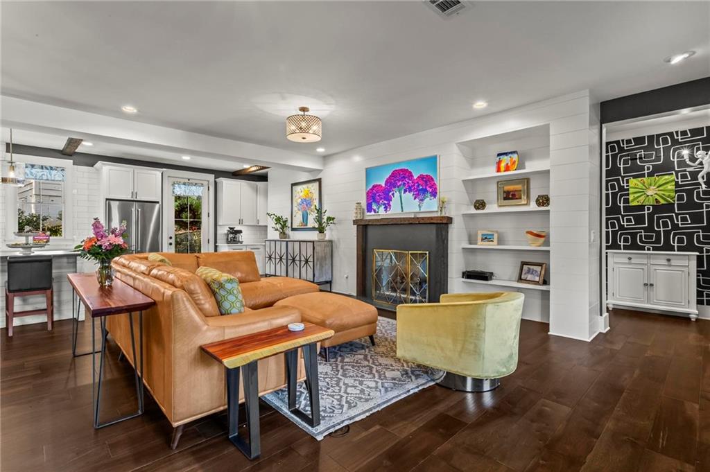 53 Maple Street Roswell, GA 30075 - Photo 10 of 59 a living room with furniture and a fireplace