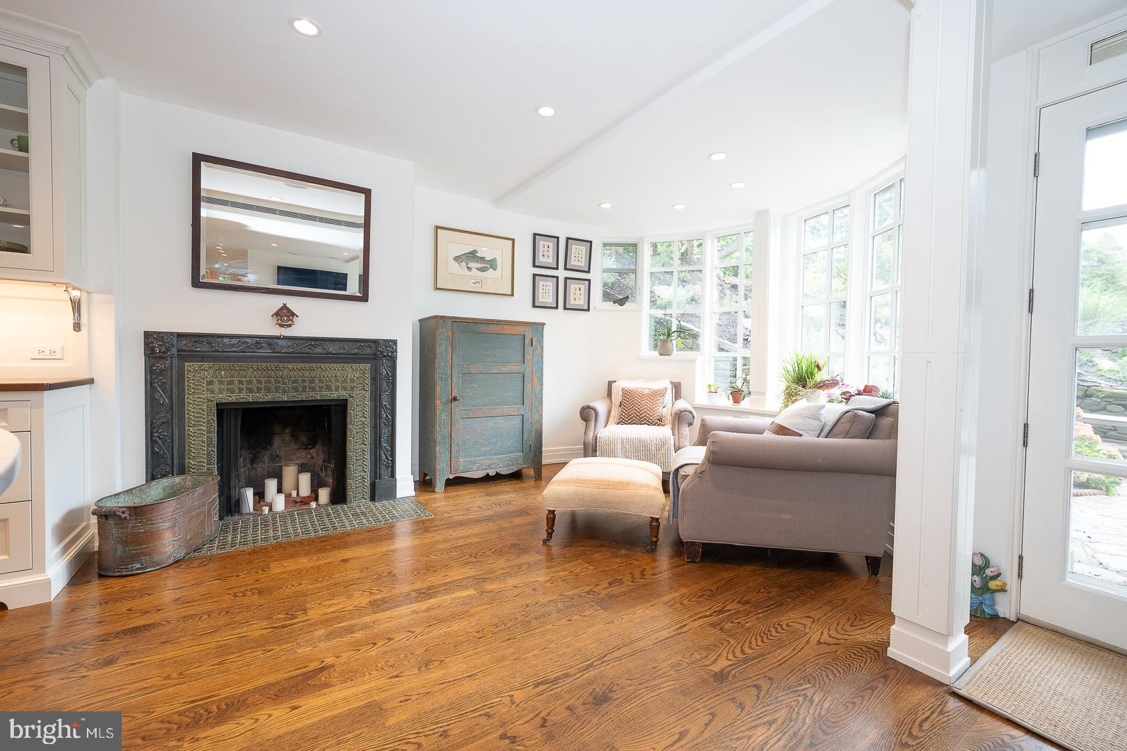 15 Old Gulph Road Gladwyne, PA 19035 - Photo 15 of 66 a living room with furniture and a fireplace
