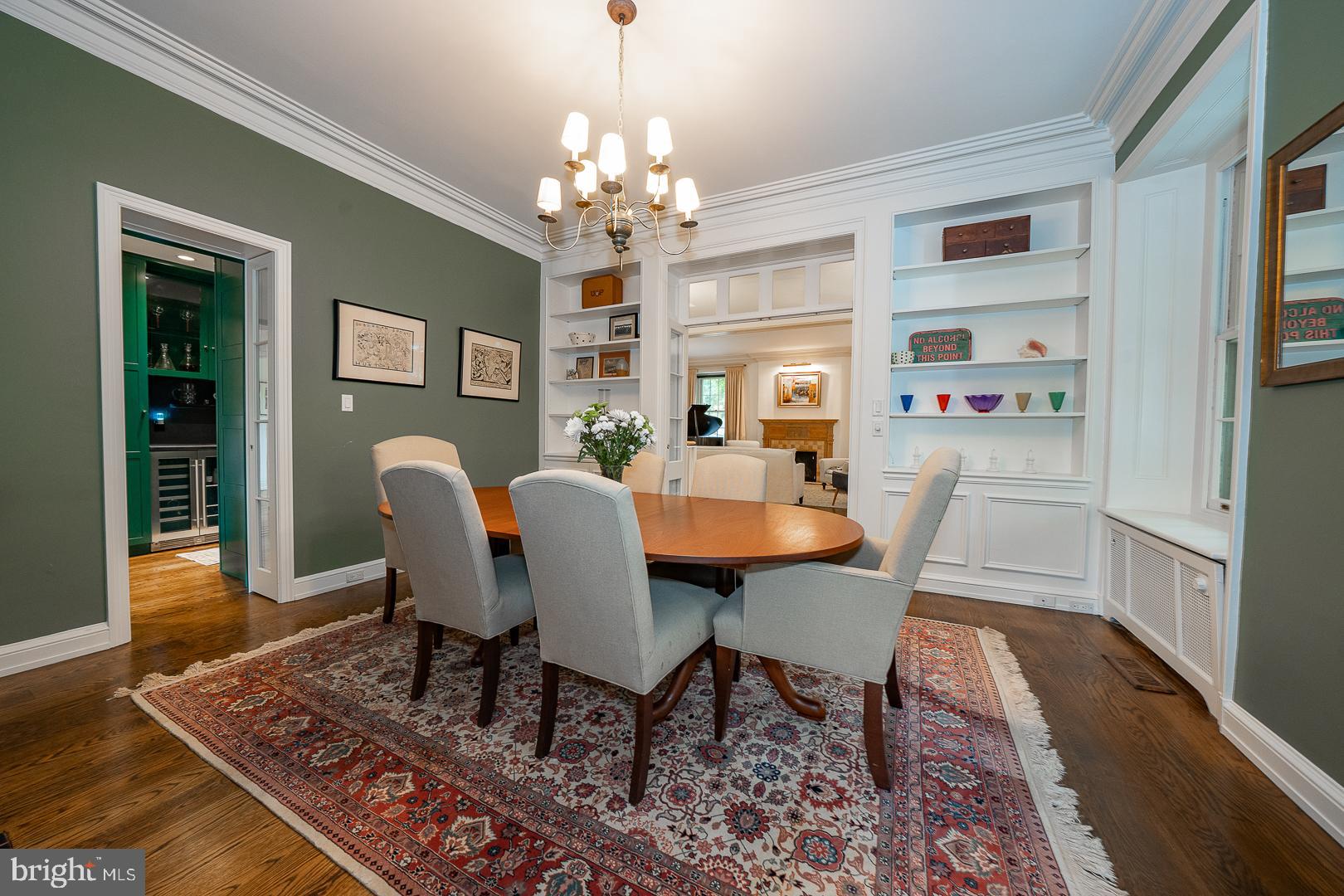 15 Old Gulph Road Gladwyne, PA 19035 - Photo 16 of 66 a view of a dining room with furniture a rug and wooden floor