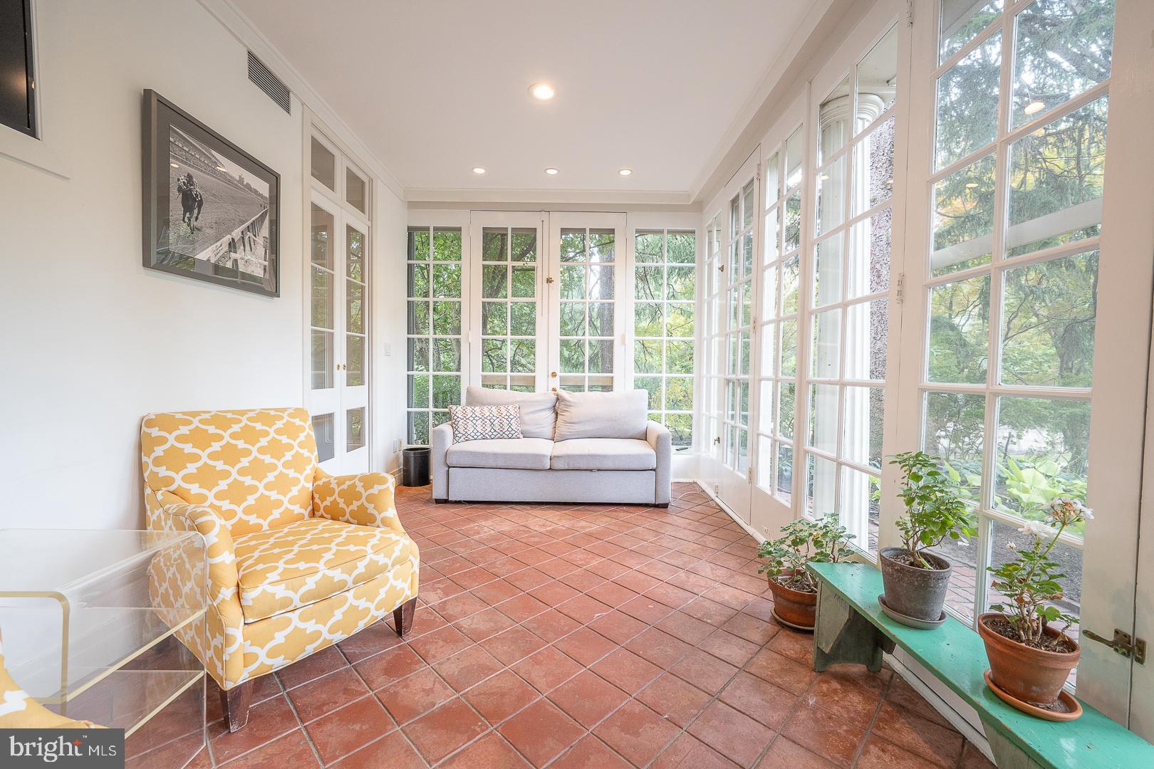 15 Old Gulph Road Gladwyne, PA 19035 - Photo 22 of 66 a living room with furniture and a large window
