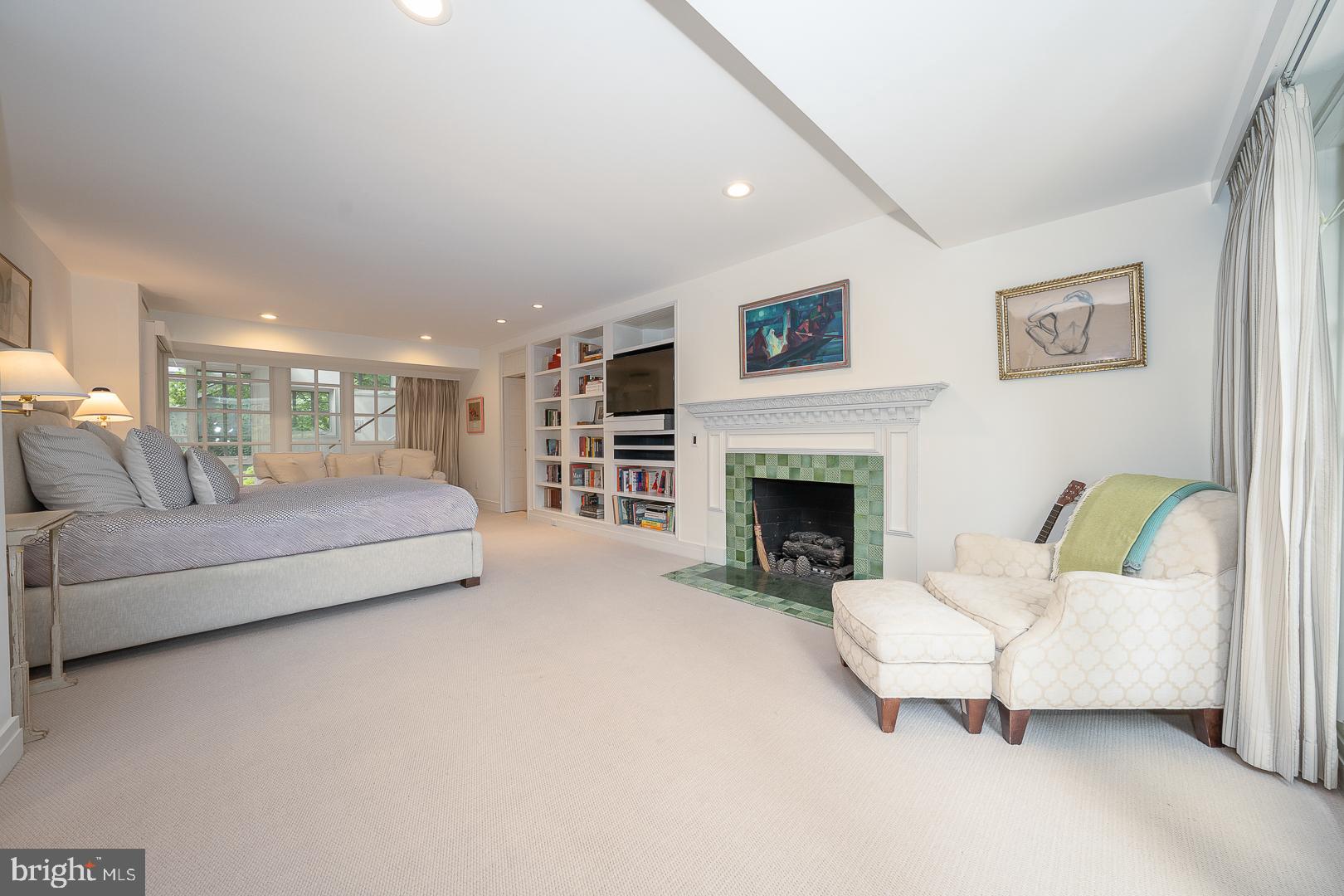 15 Old Gulph Road Gladwyne, PA 19035 - Photo 25 of 66 a living room with furniture and a fireplace