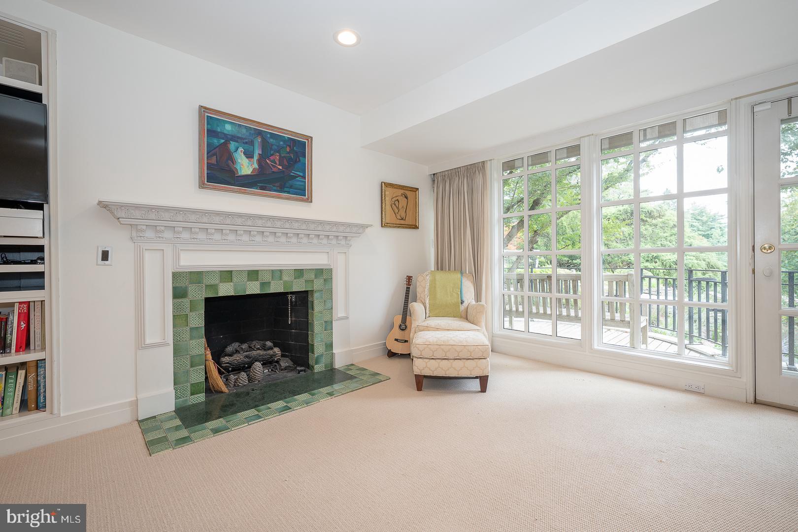 15 Old Gulph Road Gladwyne, PA 19035 - Photo 26 of 66 a living room with furniture and a fireplace