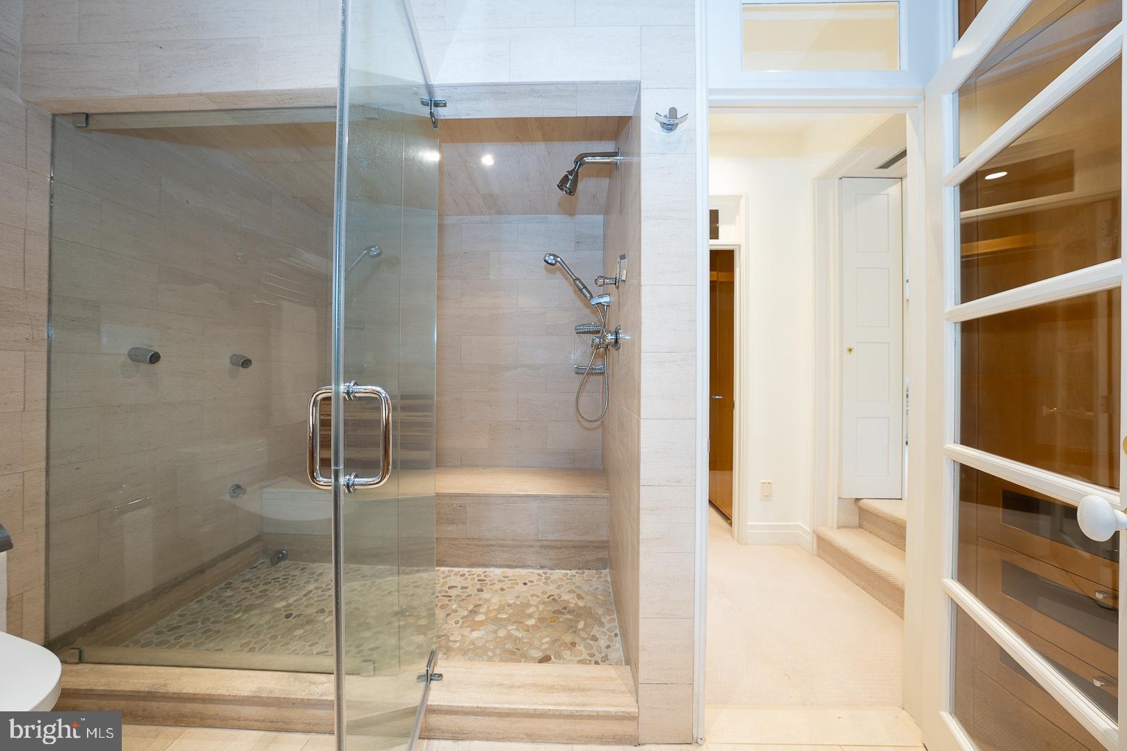 15 Old Gulph Road Gladwyne, PA 19035 - Photo 29 of 66 a bathroom with a glass shower door