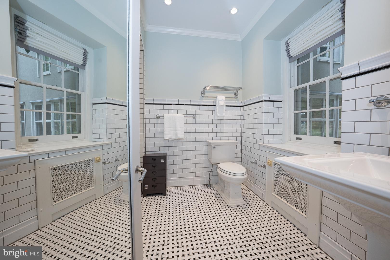 15 Old Gulph Road Gladwyne, PA 19035 - Photo 38 of 66 a bathroom with a toilet a sink and a shower