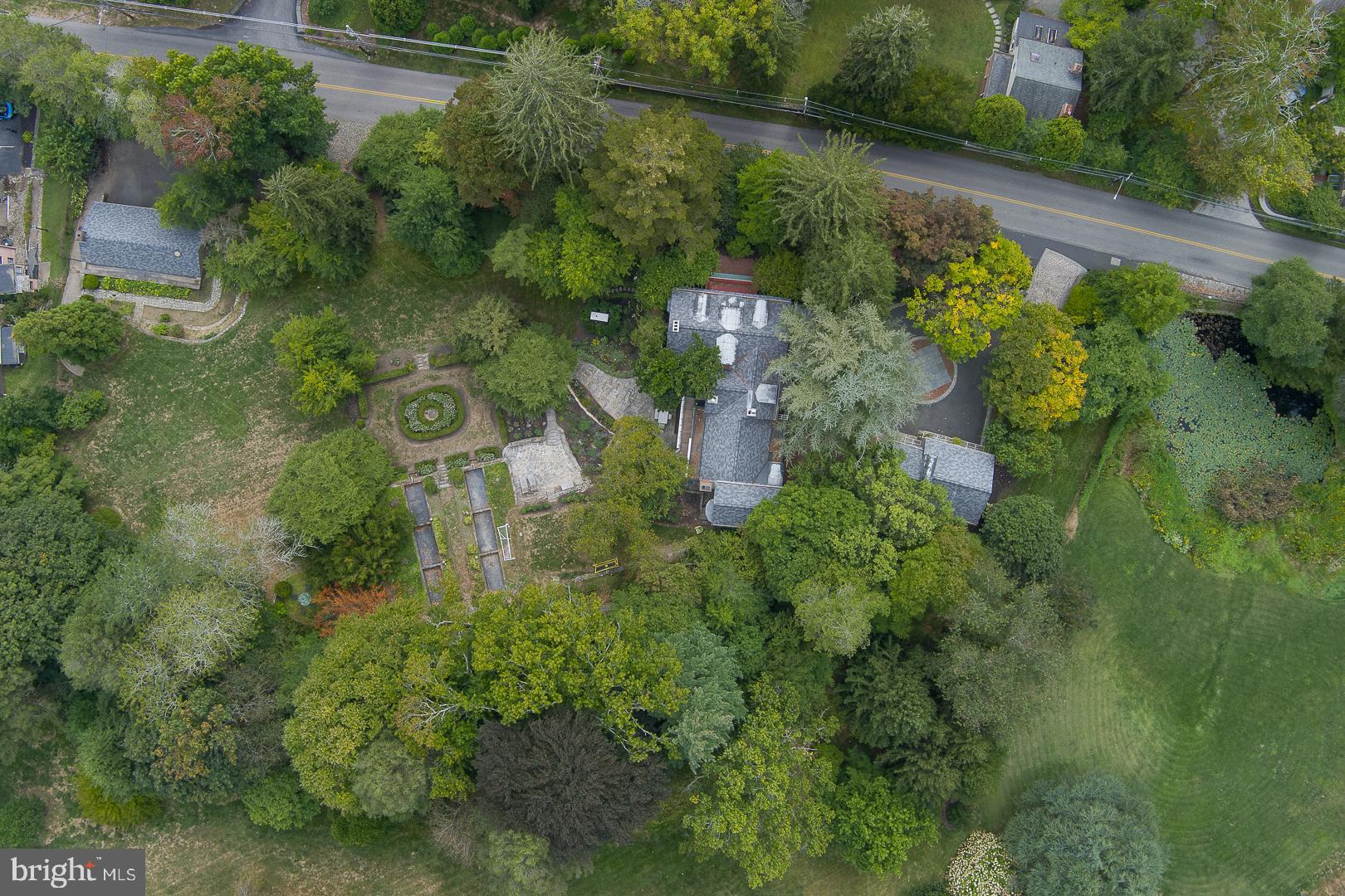 15 Old Gulph Road Gladwyne, PA 19035 - Photo 4 of 66 an aerial view of a house with a yard
