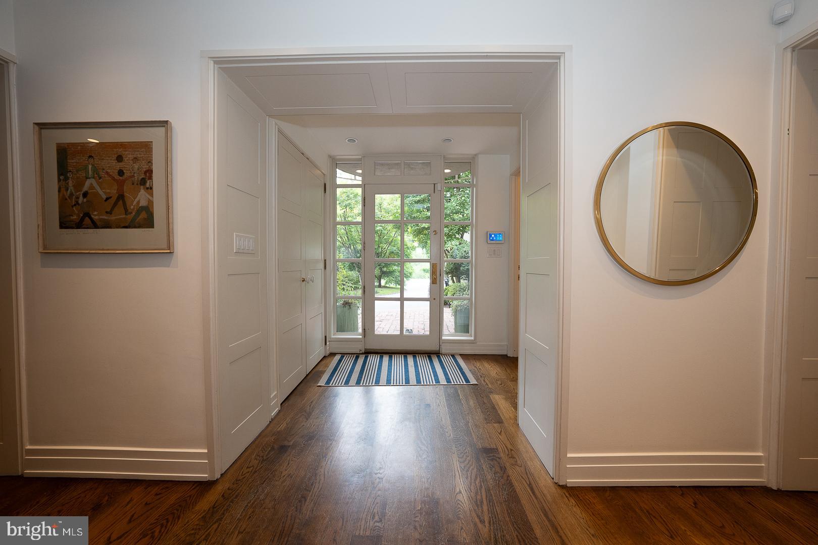 15 Old Gulph Road Gladwyne, PA 19035 - Photo 6 of 66 an empty room with wooden floor and windows