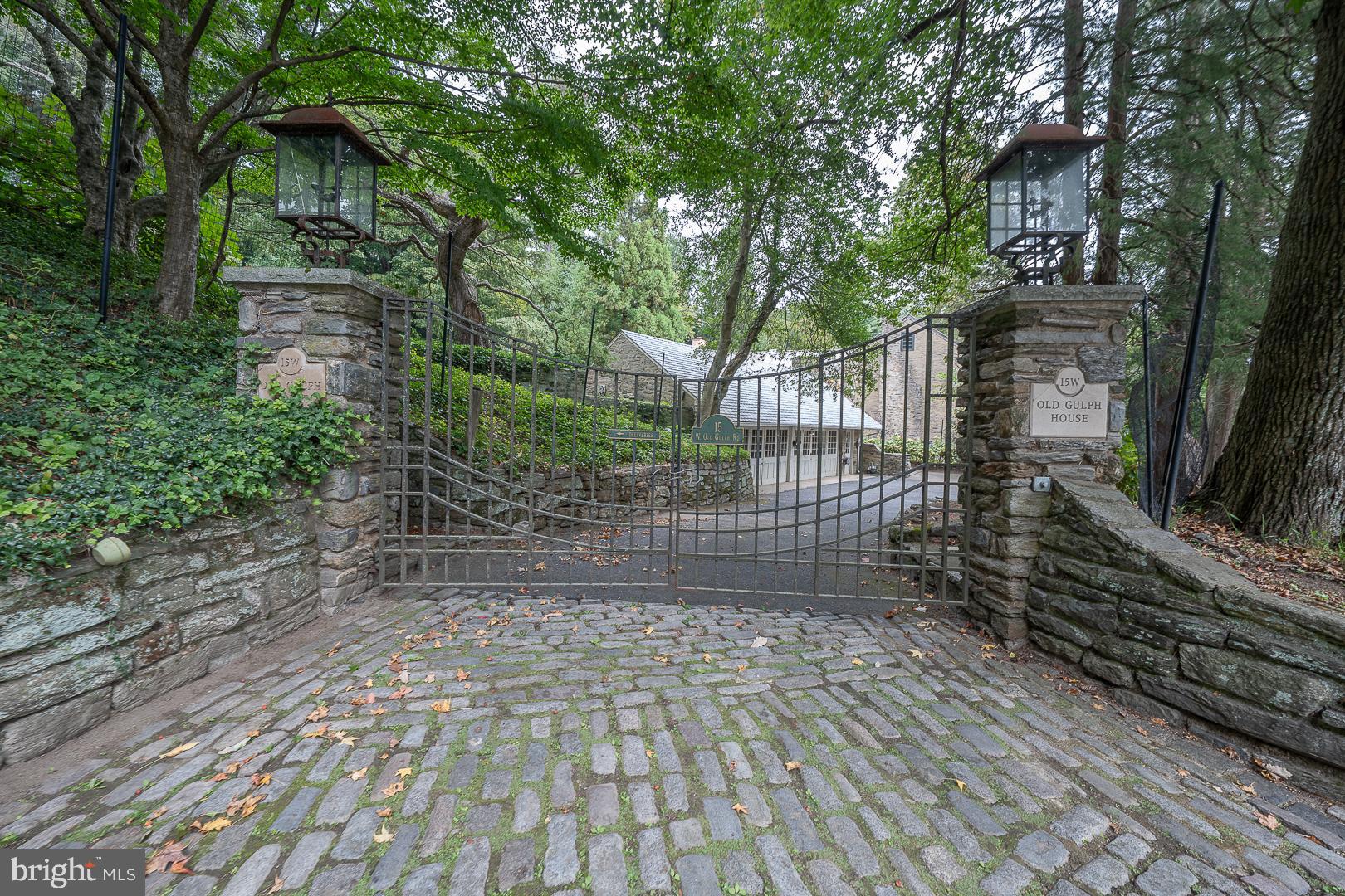 15 Old Gulph Road Gladwyne, PA 19035 - Photo 64 of 66 a view of a yard with plants and trees