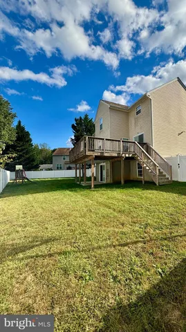 a view of a lake with a big yard