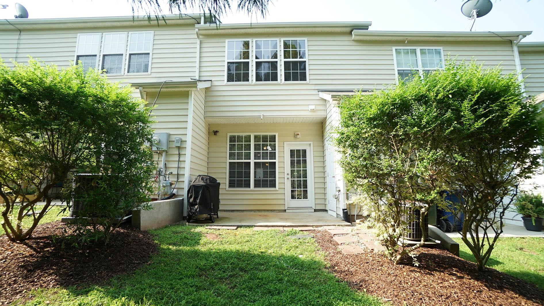 7842 Silverthread Lane Raleigh, NC 27617 - Photo 24 of 26 *Peaceful Back Patio w/ Storage Room & Space for a Grill*