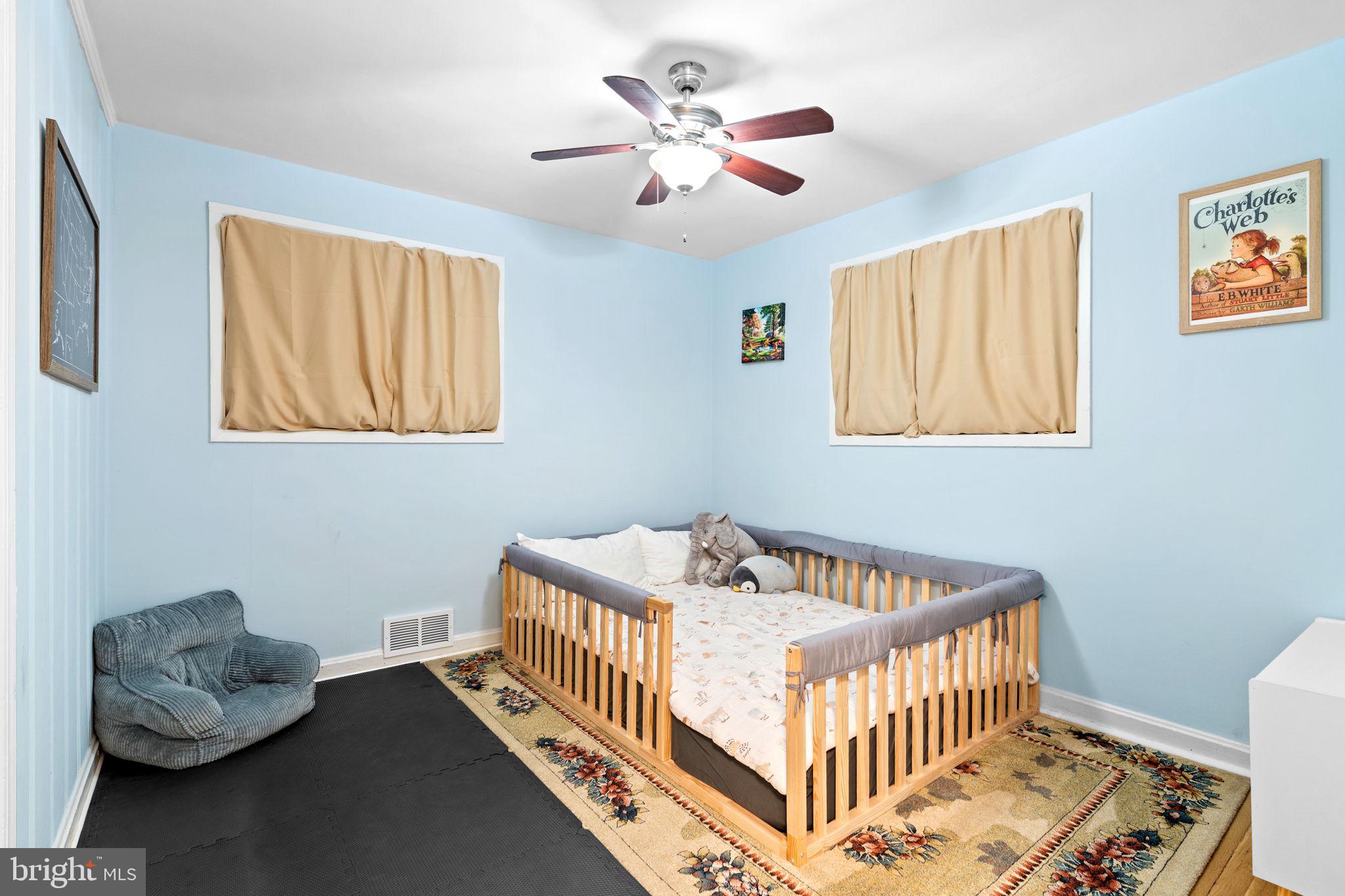 10310 Brunswick Avenue Silver Spring, MD 20902 - Photo 20 of 43 Charming nursery with soft blue hues.