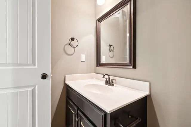 a view of a house with wooden deck