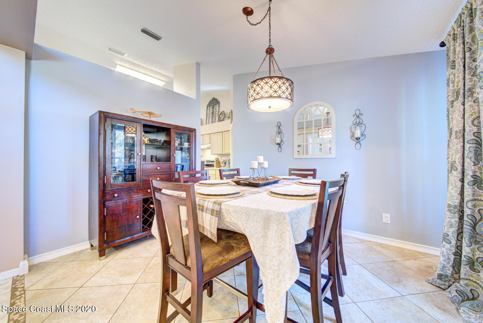 4359 Eastman Street Cocoa, FL 32927 - Photo 11 of 52 a view of a dining room and a table and chairs