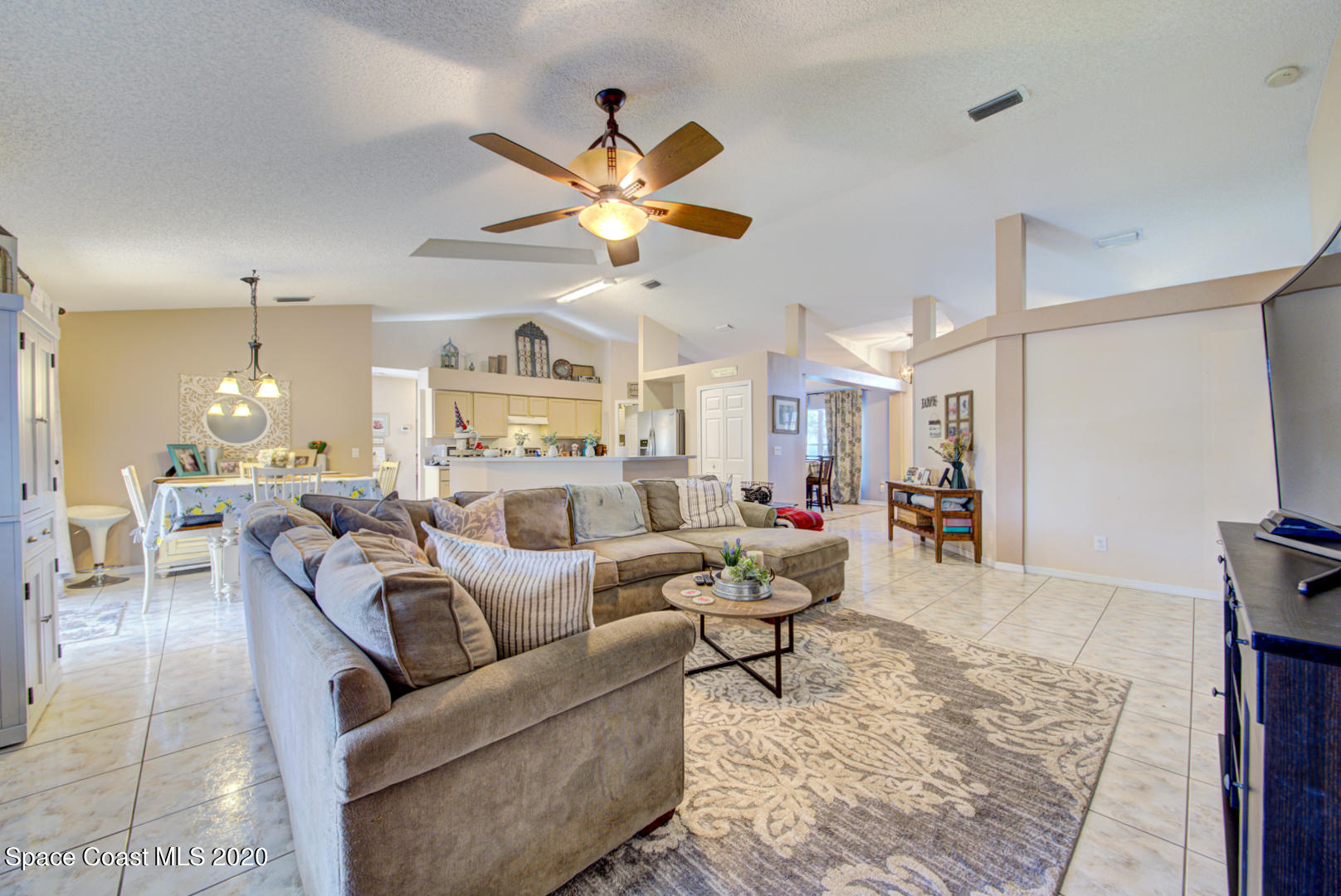 4359 Eastman Street Cocoa, FL 32927 - Photo 13 of 52 a living room with furniture and kitchen view