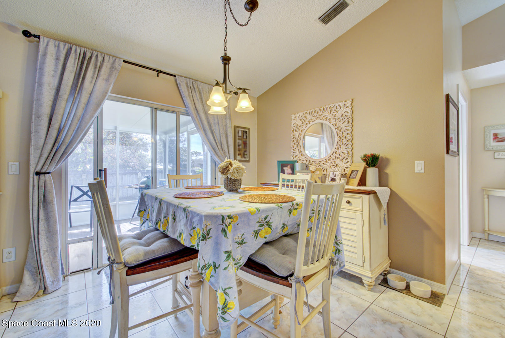 4359 Eastman Street Cocoa, FL 32927 - Photo 24 of 52 a view of a dining room with furniture window and outside view