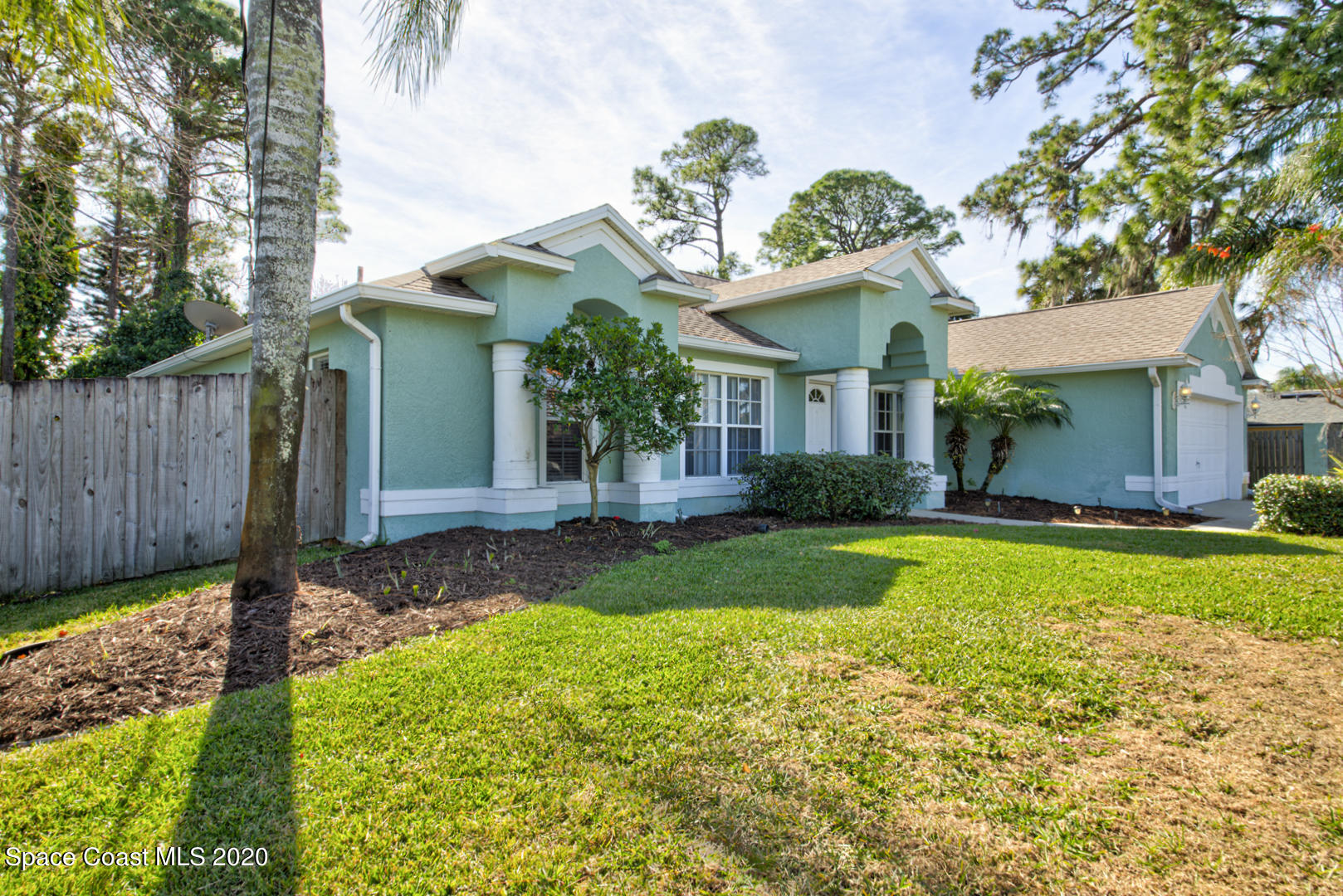 4359 Eastman Street Cocoa, FL 32927 - Photo 4 of 52 a front view of a house with garden