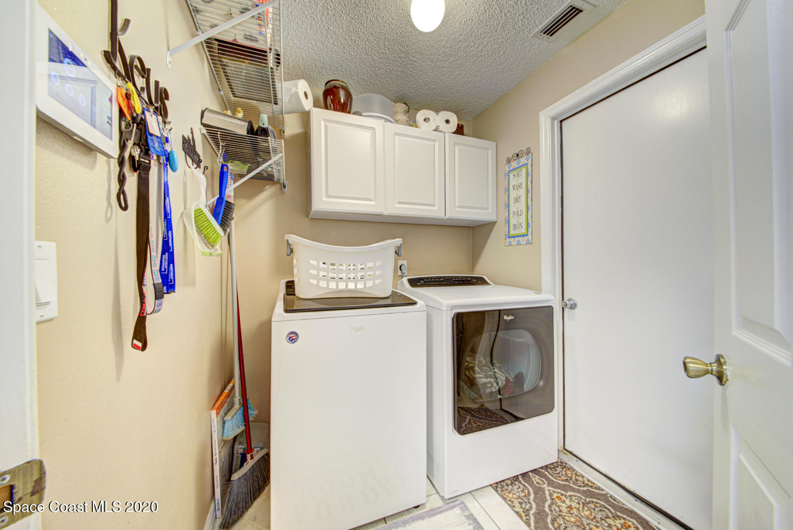 4359 Eastman Street Cocoa, FL 32927 - Photo 43 of 52 a utility room with dryer and washer