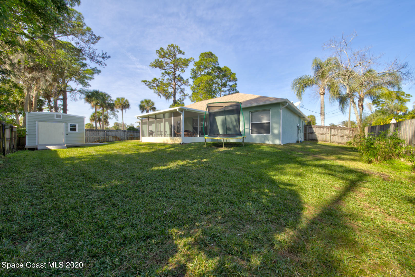 4359 Eastman Street Cocoa, FL 32927 - Photo 49 of 52 a view of a house with a big yard