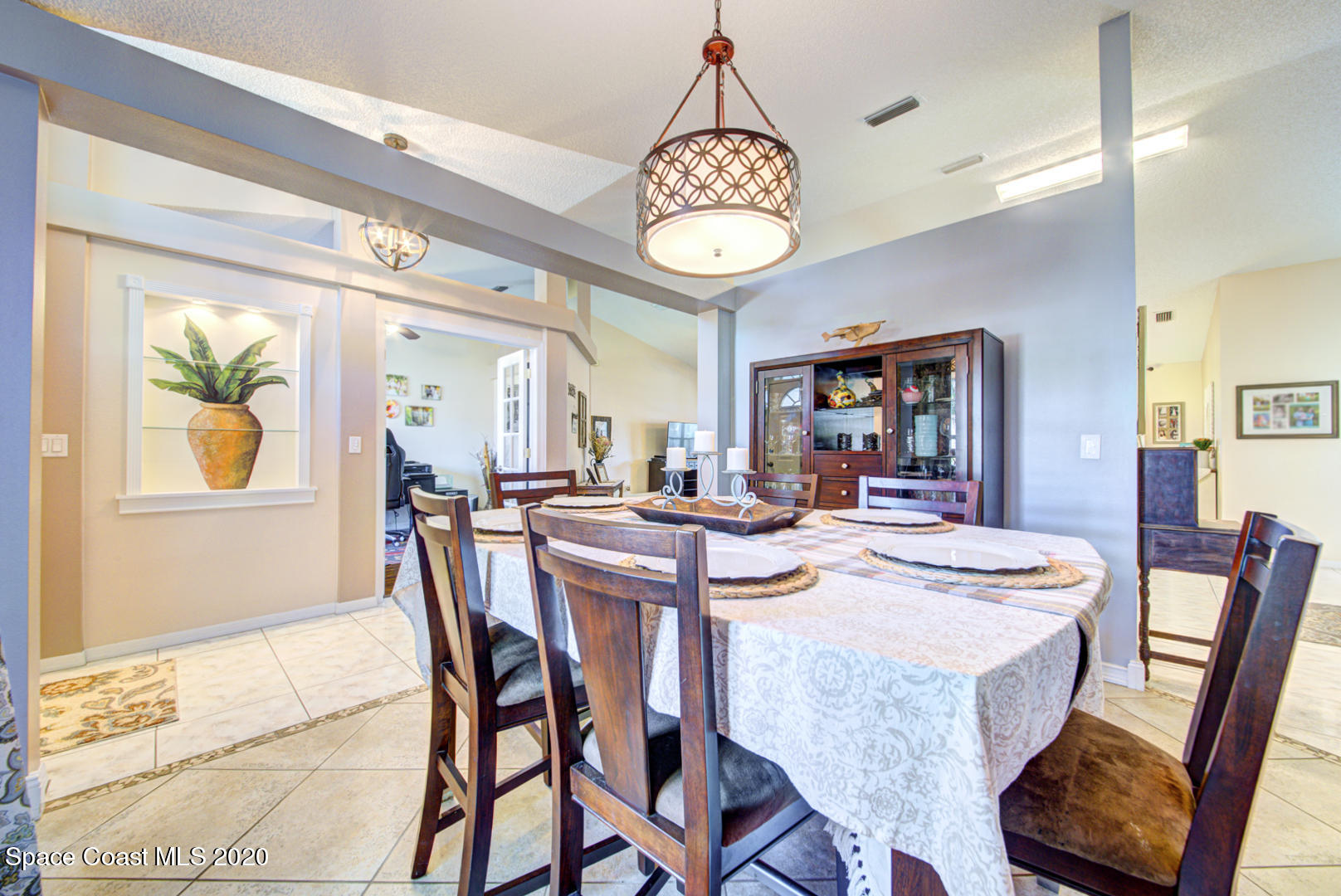 4359 Eastman Street Cocoa, FL 32927 - Photo 9 of 52 a view of a dining room and livingroom