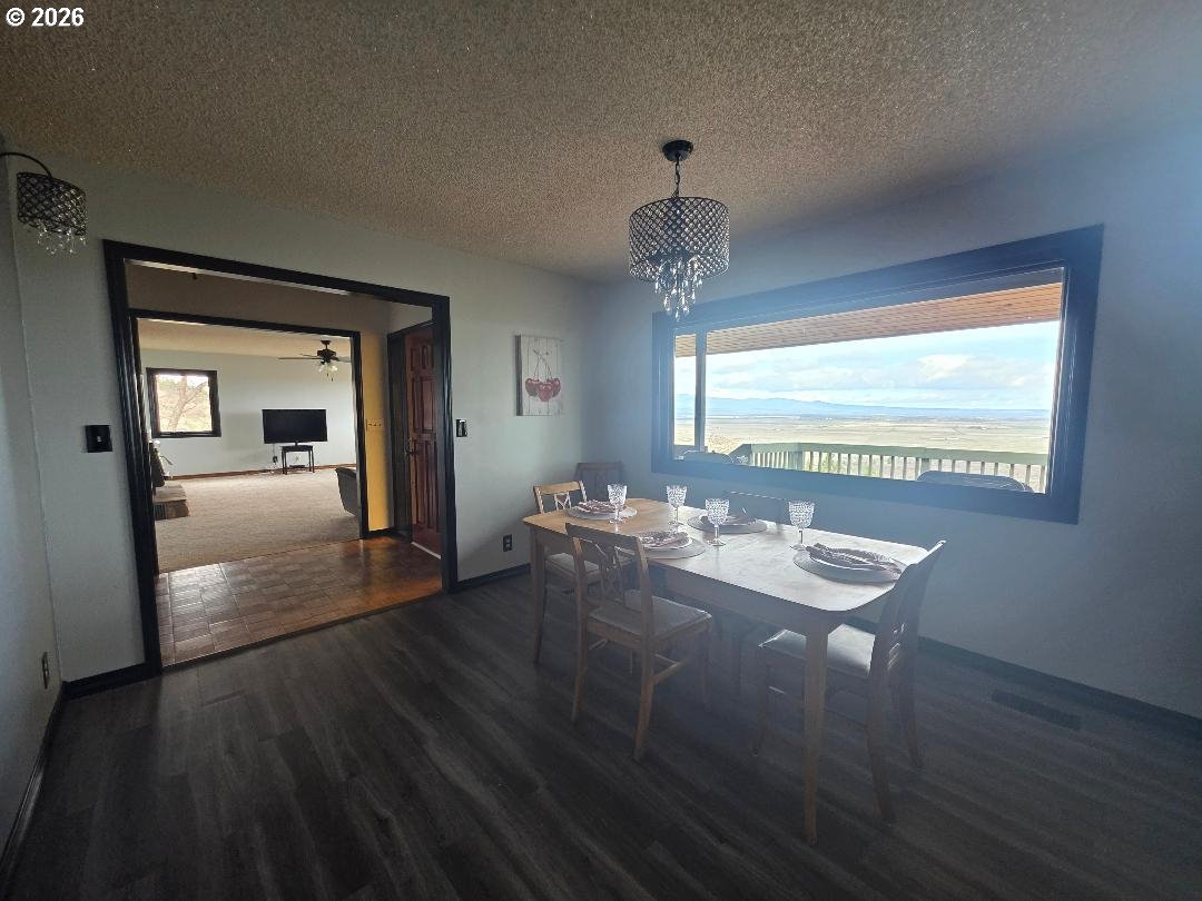 78902 Walters Road Maupin, OR 97037 - Photo 15 of 47 a view of a livingroom with furniture wooden floor and a chandelier