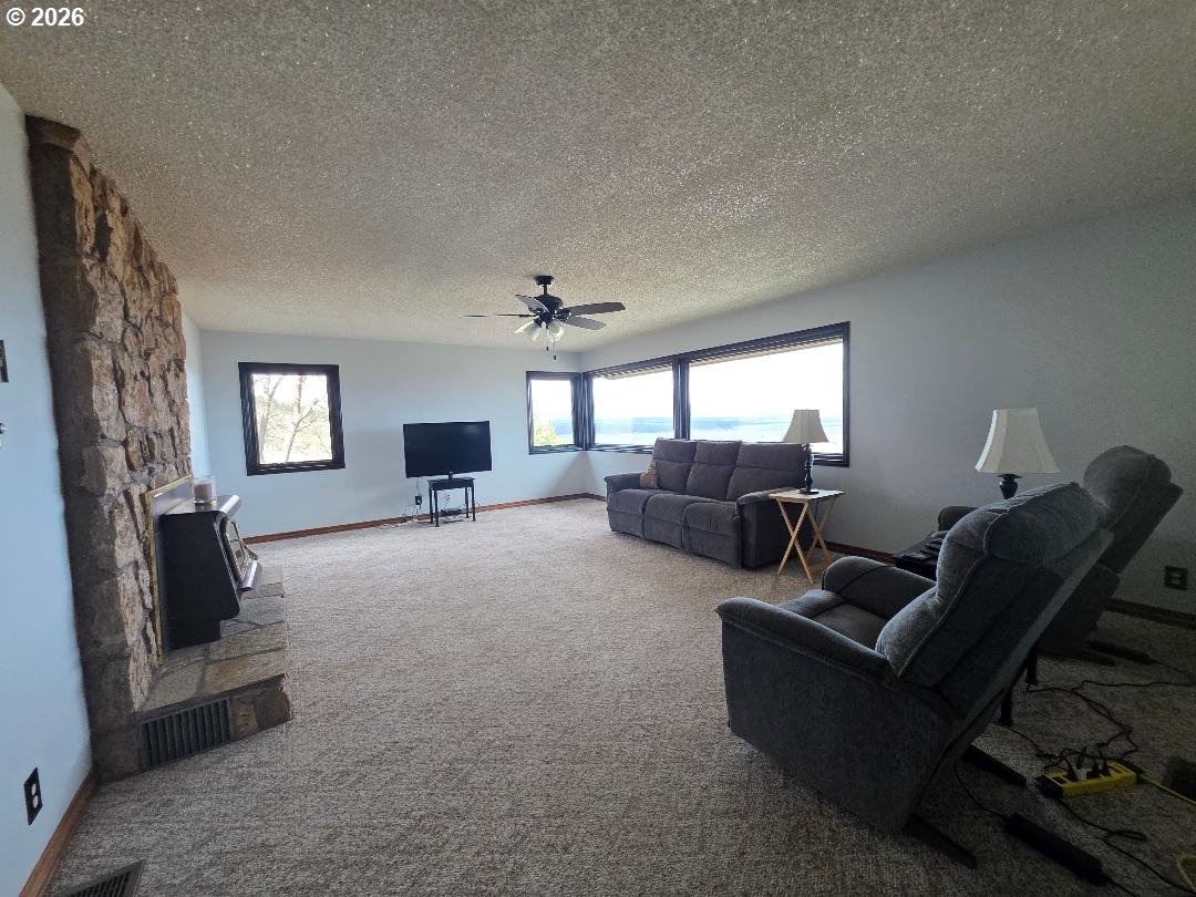 78902 Walters Road Maupin, OR 97037 - Photo 18 of 47 a living room with furniture and a flat screen tv