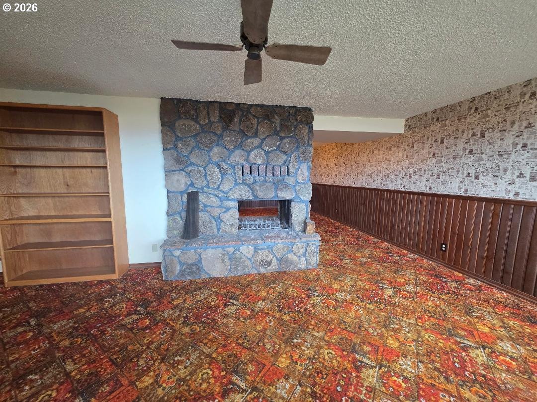 78902 Walters Road Maupin, OR 97037 - Photo 33 of 47 a view of fireplace and wooden floor