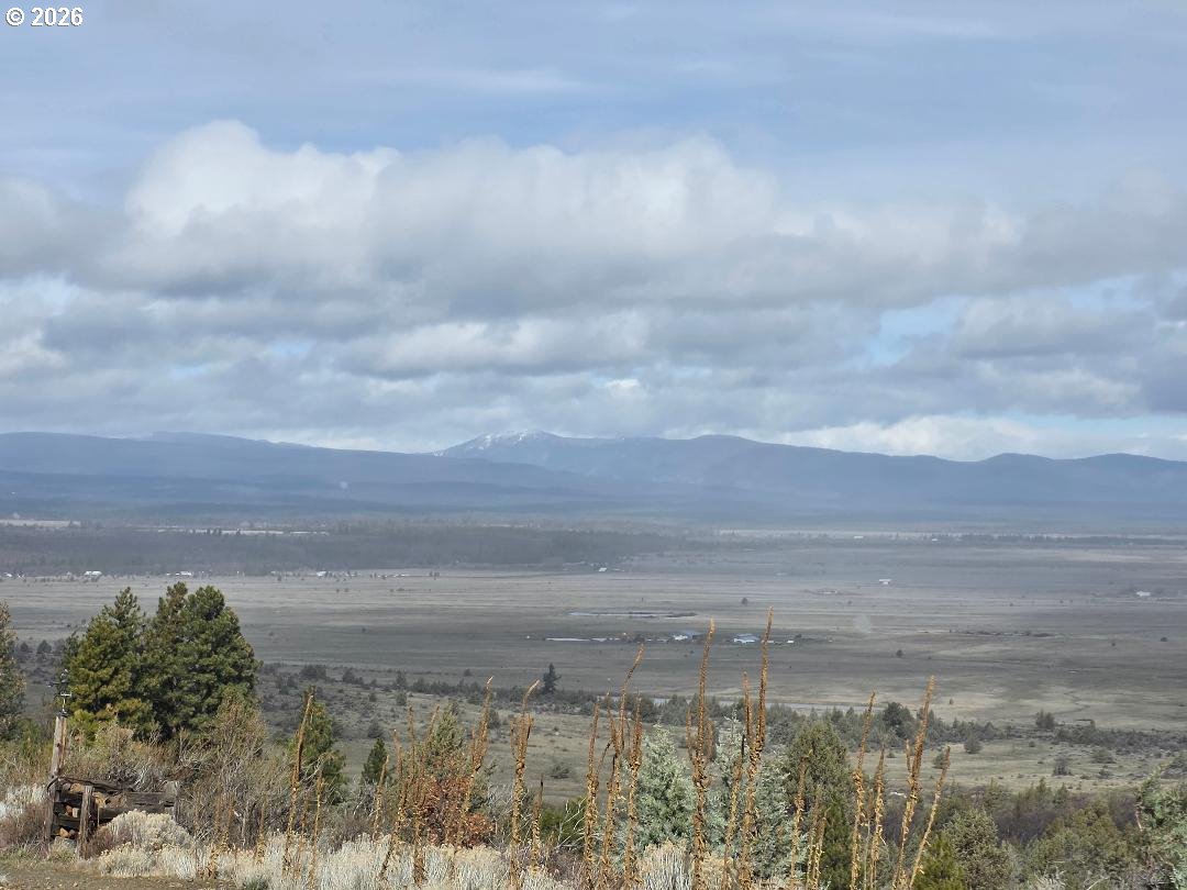 78902 Walters Road Maupin, OR 97037 - Photo 6 of 47 a view of a lake with a big yard