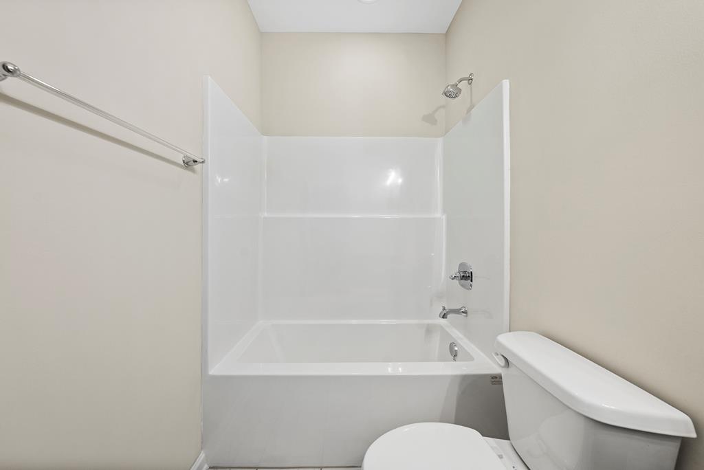 635 Bohannon Road Grantville, GA 30220 - Photo 20 of 43 a bathroom with a toilet bathtub and shower