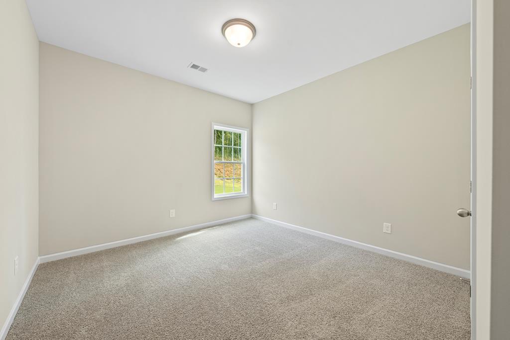 635 Bohannon Road Grantville, GA 30220 - Photo 21 of 43 an empty room with a window