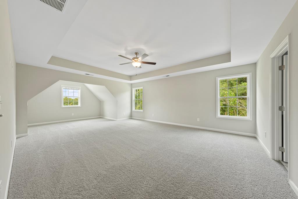 635 Bohannon Road Grantville, GA 30220 - Photo 23 of 43 a view of a room with windows and chandelier fan