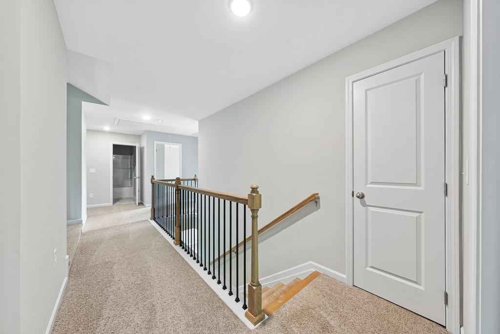 635 Bohannon Road Grantville, GA 30220 - Photo 30 of 43 a view of a hallway with three rooms