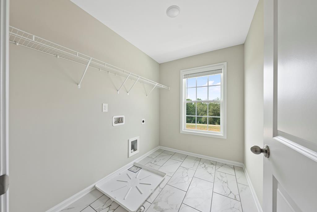635 Bohannon Road Grantville, GA 30220 - Photo 37 of 43 a view of an empty room with a window