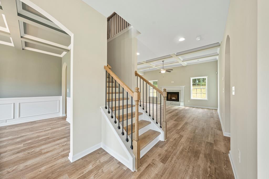 635 Bohannon Road Grantville, GA 30220 - Photo 8 of 43 a view of a hallway with wooden floor and stairs