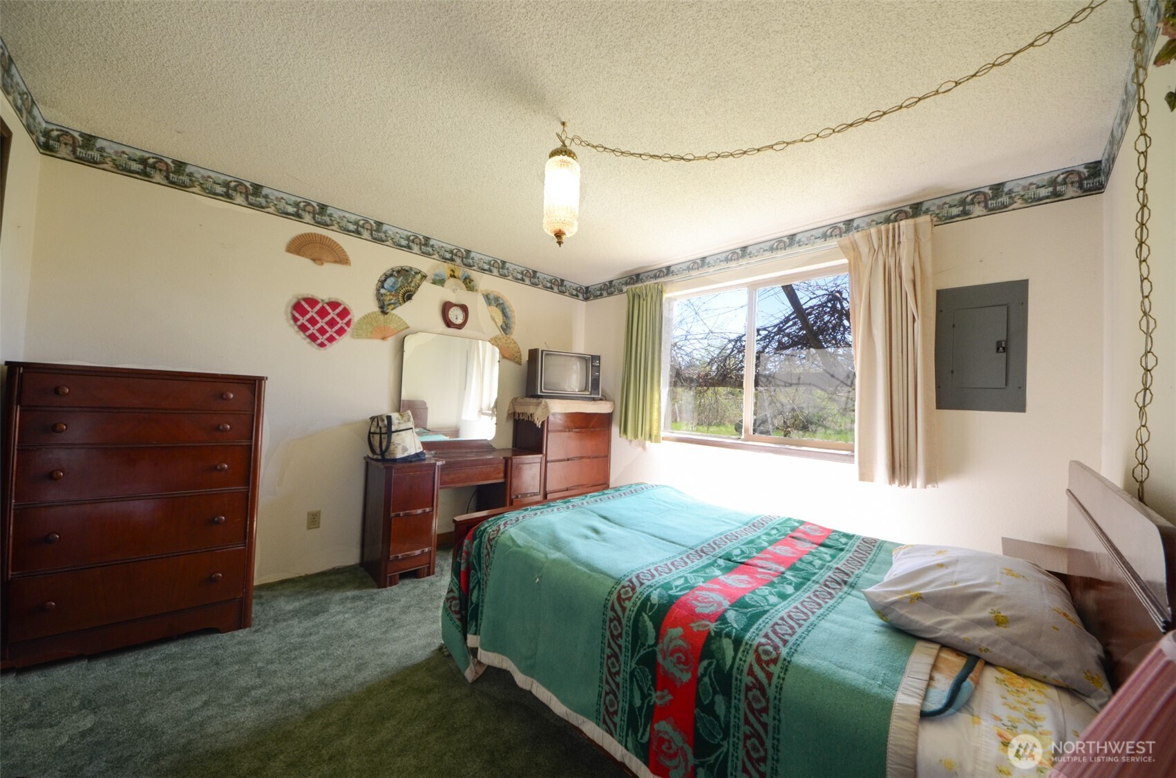 8941 183rd Avenue Southwest Rochester, WA 98579 - Photo 6 of 19 a bedroom with a bed and a dresser