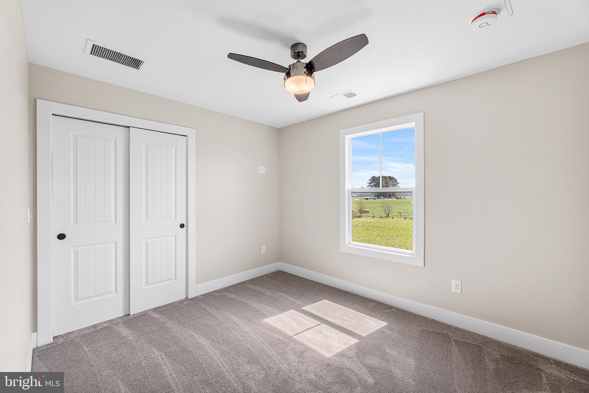 24766 Tribbett Circle Ridgely, MD 21660 - Photo 24 of 41 a view of an empty room and window