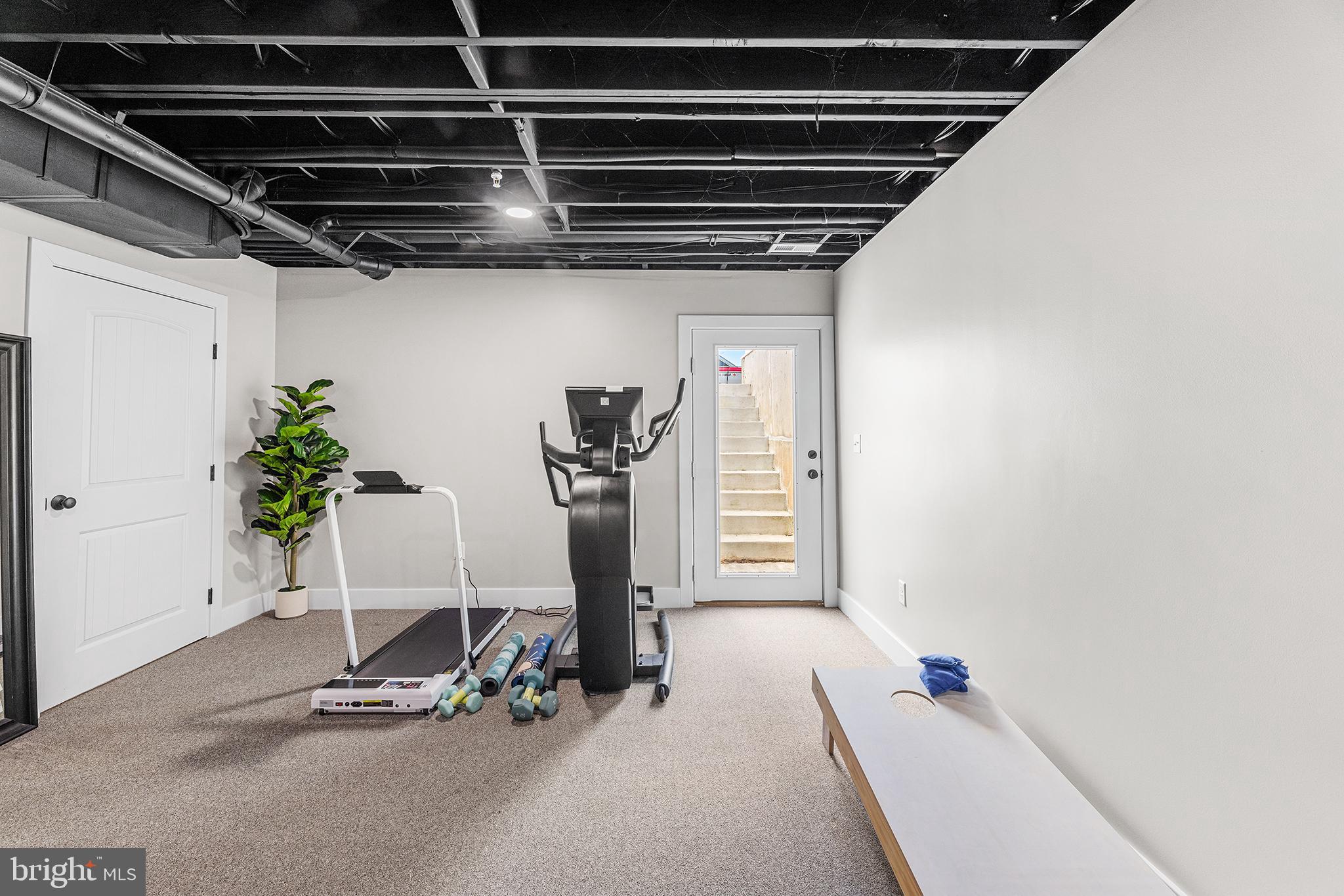 24766 Tribbett Circle Ridgely, MD 21660 - Photo 34 of 41 a view of a room with gym equipment