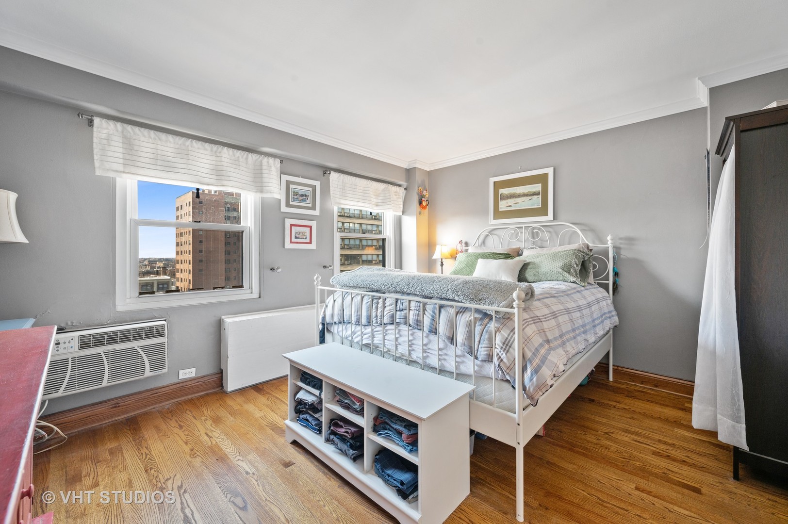 2909 North Sheridan Road, Unit 1105 Chicago, IL 60657 - Photo 8 of 11 a bedroom with a bed and a window