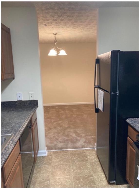 6102 Fairington Club Drive Lithonia, GA 30038 - Photo 5 of 12 a bathroom with a granite countertop sink and a mirror