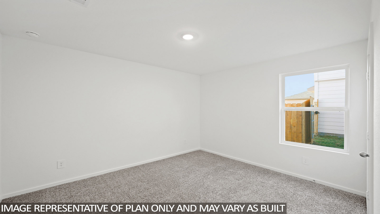 165 Baby Calf Roping Road Jarrell, TX 76537 - Photo 15 of 24 A well-lit, neutral room provides a versatile canvas for your personalized living space.