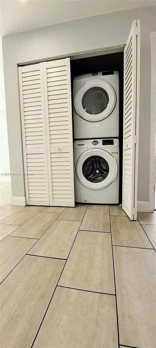 2633 Southwest 30th Court Miami, FL 33133 - Photo 3 of 24 a view of a washer and dryer in a utility room