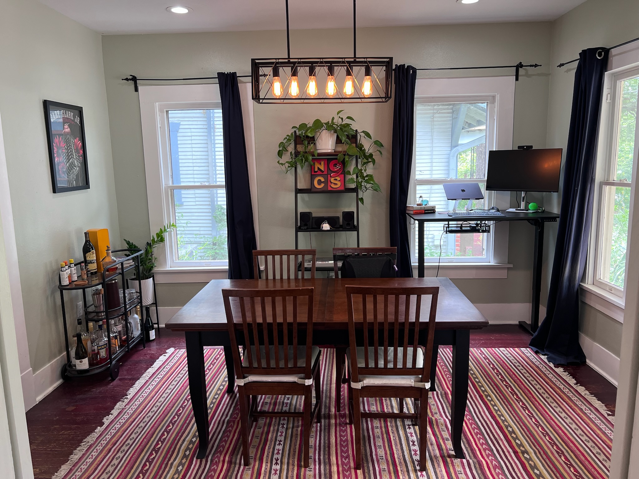 307 East 35th Street, Unit A Austin, TX 78705 - Photo 10 of 31 A versatile dining room transitions seamlessly into a productive home office, bathed in natural light.