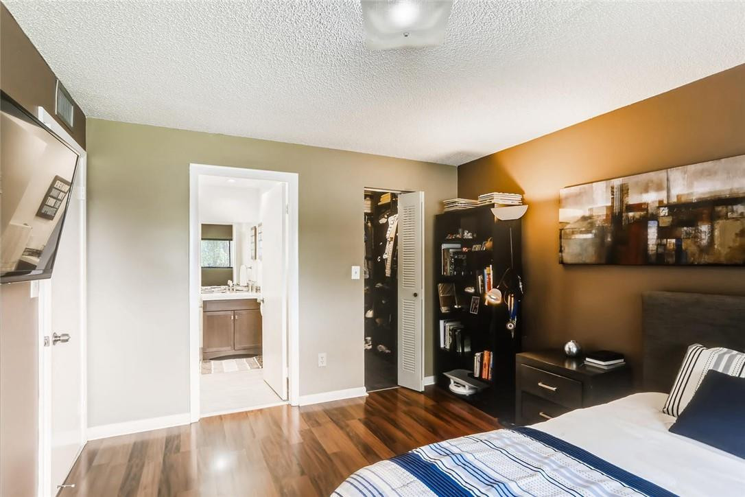9763 West McNab Road, Unit 214 Tamarac, FL 33321 - Photo 12 of 28 a view of a room with wooden floor