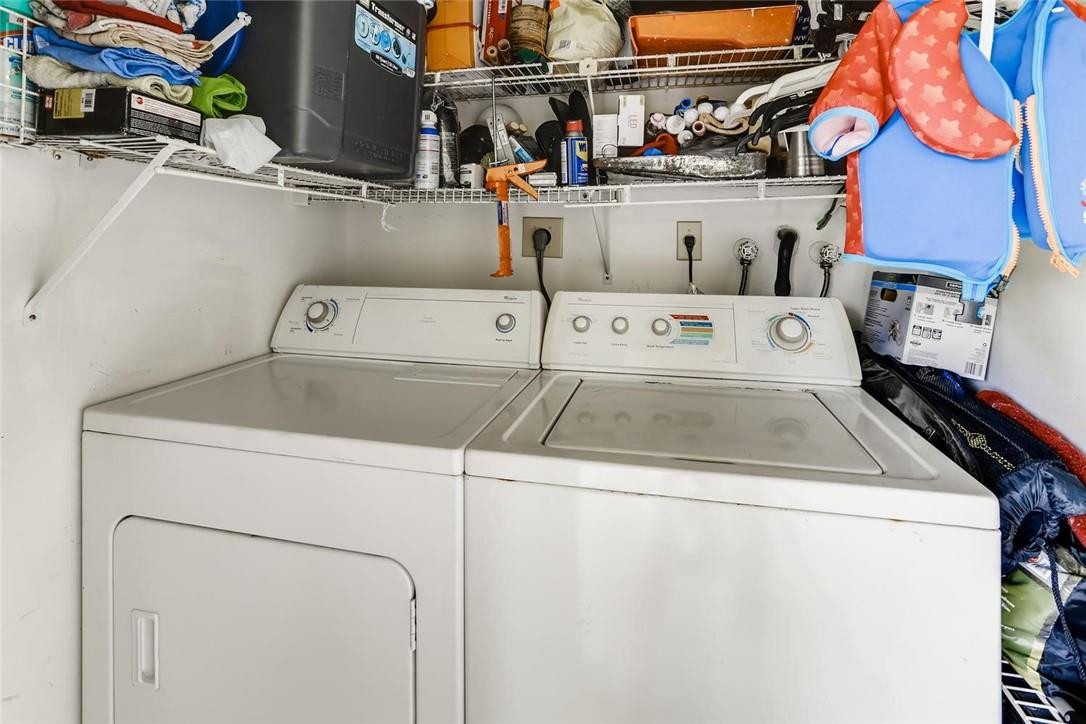 9763 West McNab Road, Unit 214 Tamarac, FL 33321 - Photo 20 of 28 a utility room with dryer and washer