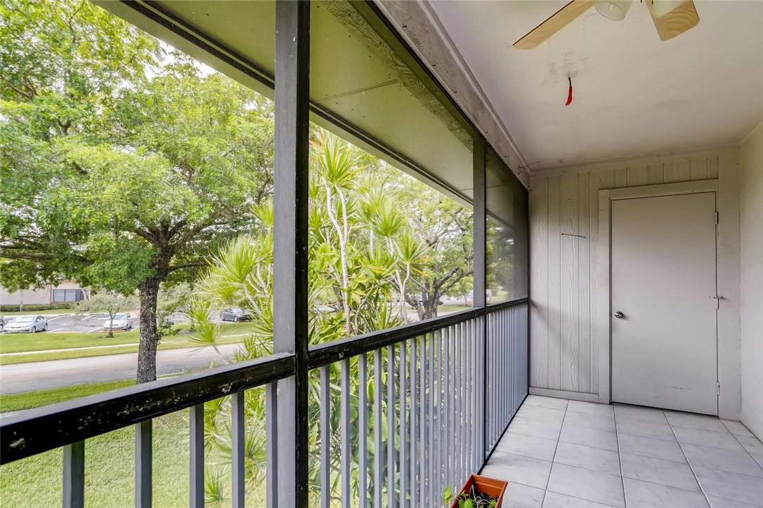 9763 West McNab Road, Unit 214 Tamarac, FL 33321 - Photo 24 of 28 a view of a porch