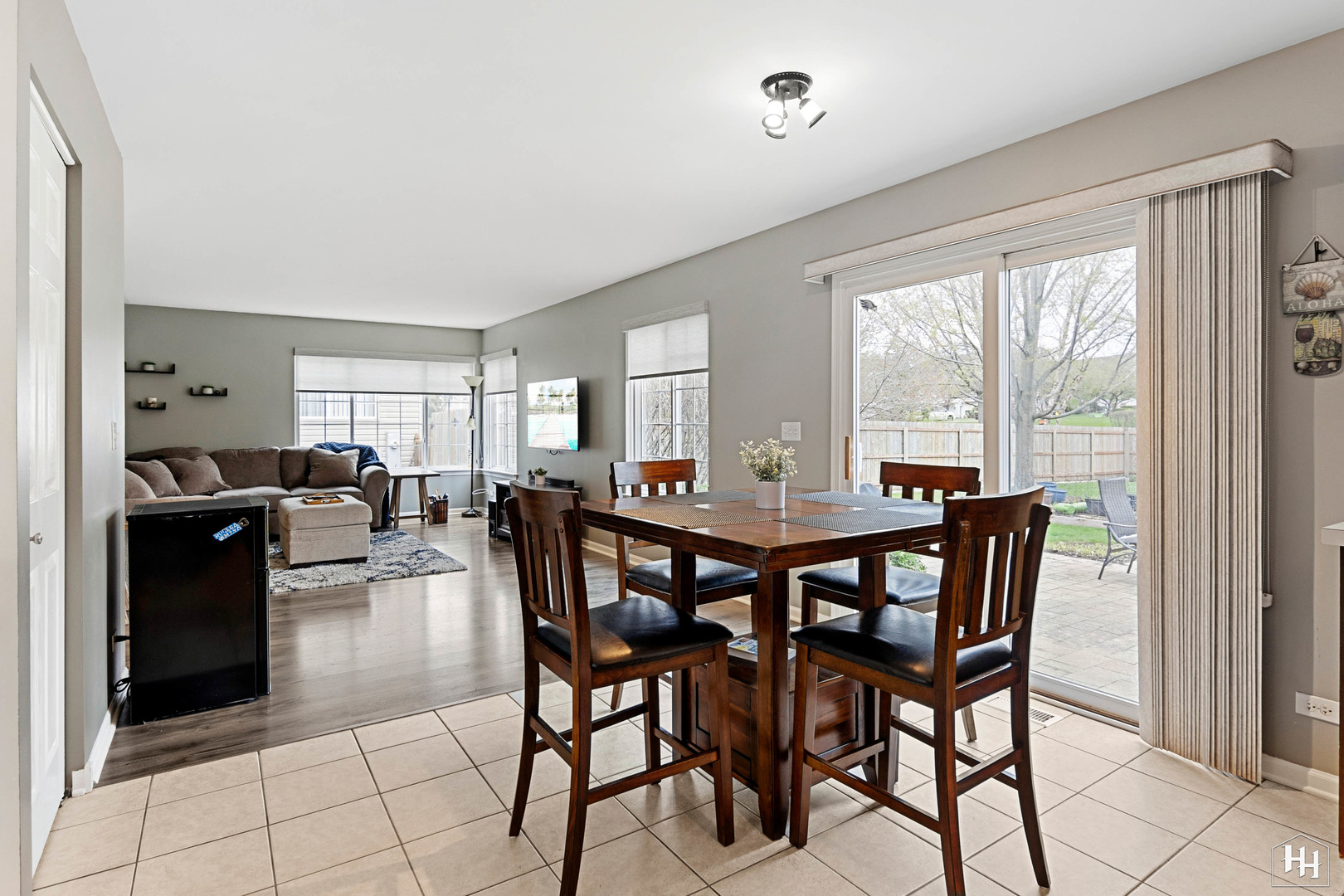 1389 Collins Drive Cary, IL 60013 - Photo 14 of 39 a view of a dining room with furniture and a large window