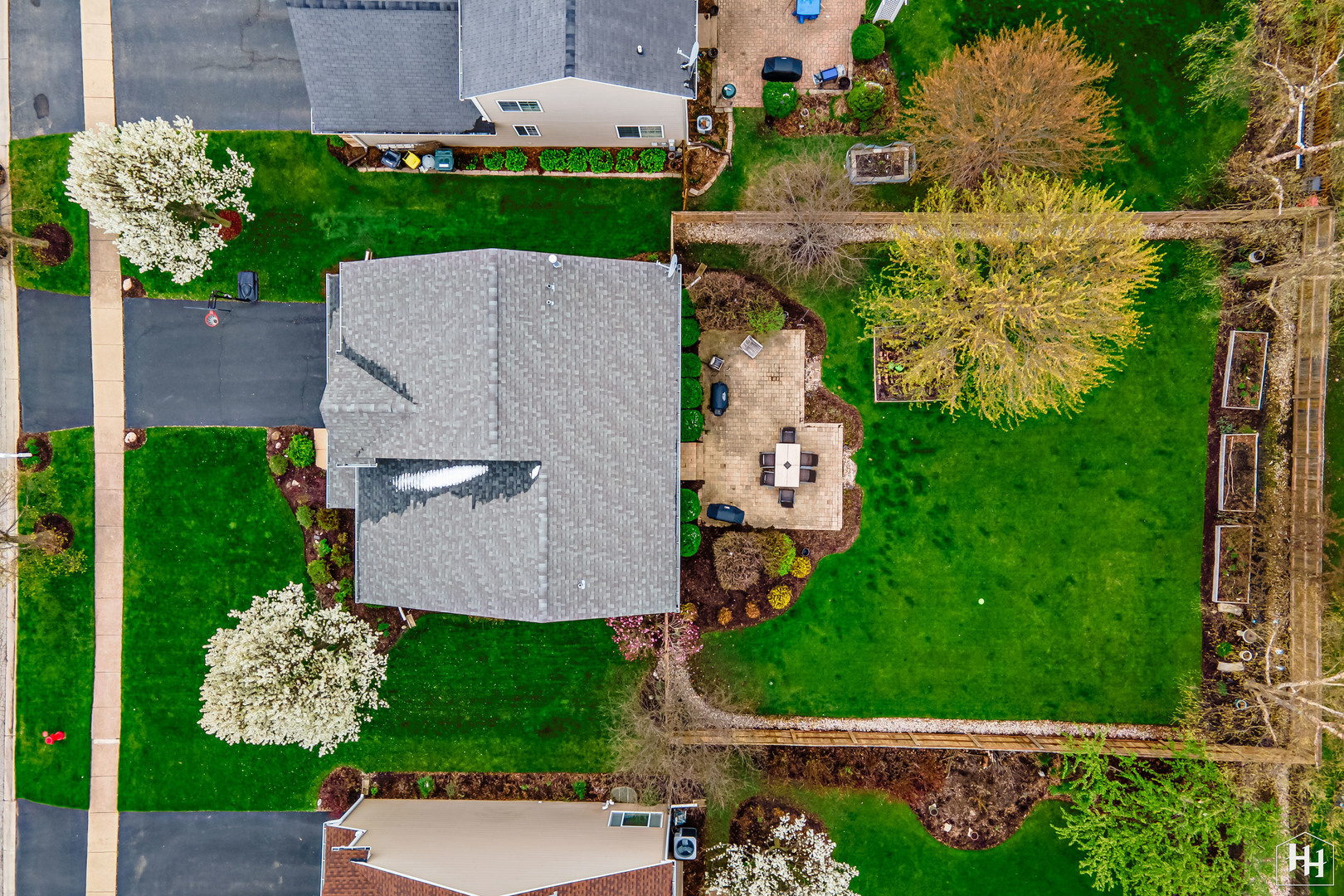 1389 Collins Drive Cary, IL 60013 - Photo 2 of 39 an aerial view of a house with a garden