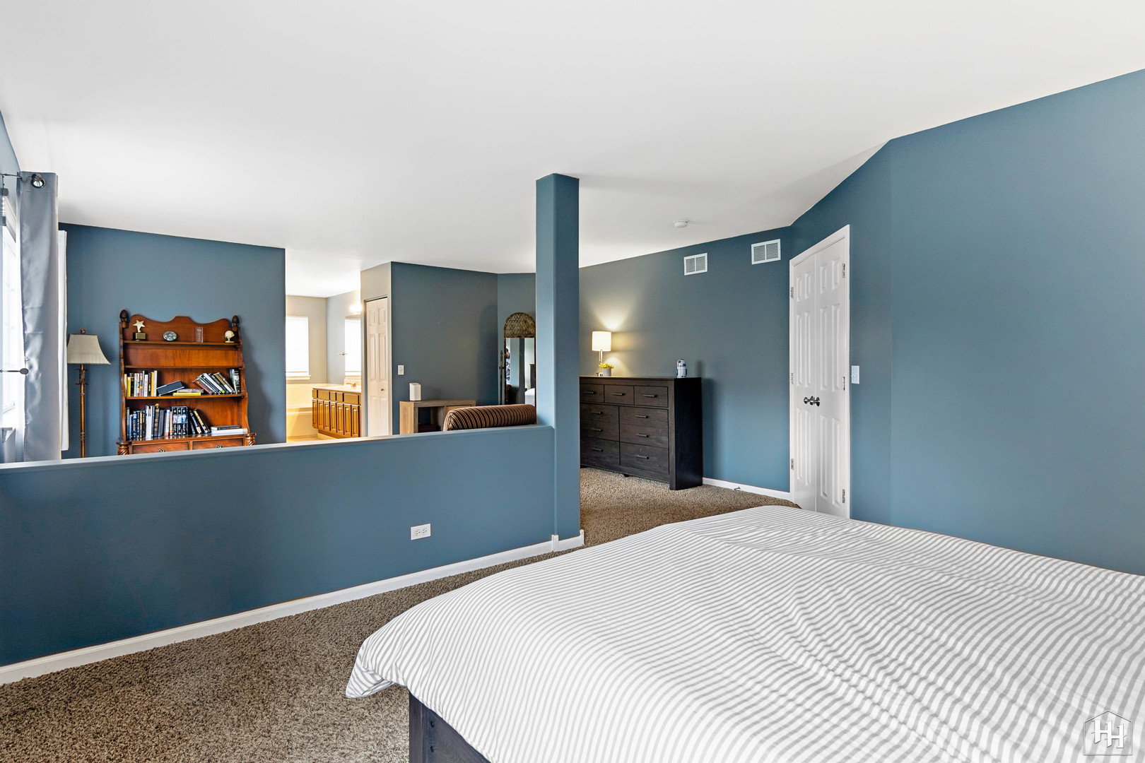 1389 Collins Drive Cary, IL 60013 - Photo 21 of 39 a bedroom with a bed and a television