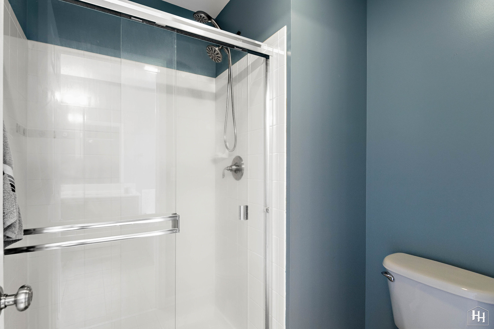 1389 Collins Drive Cary, IL 60013 - Photo 24 of 39 a bathroom with a shower and a toilet