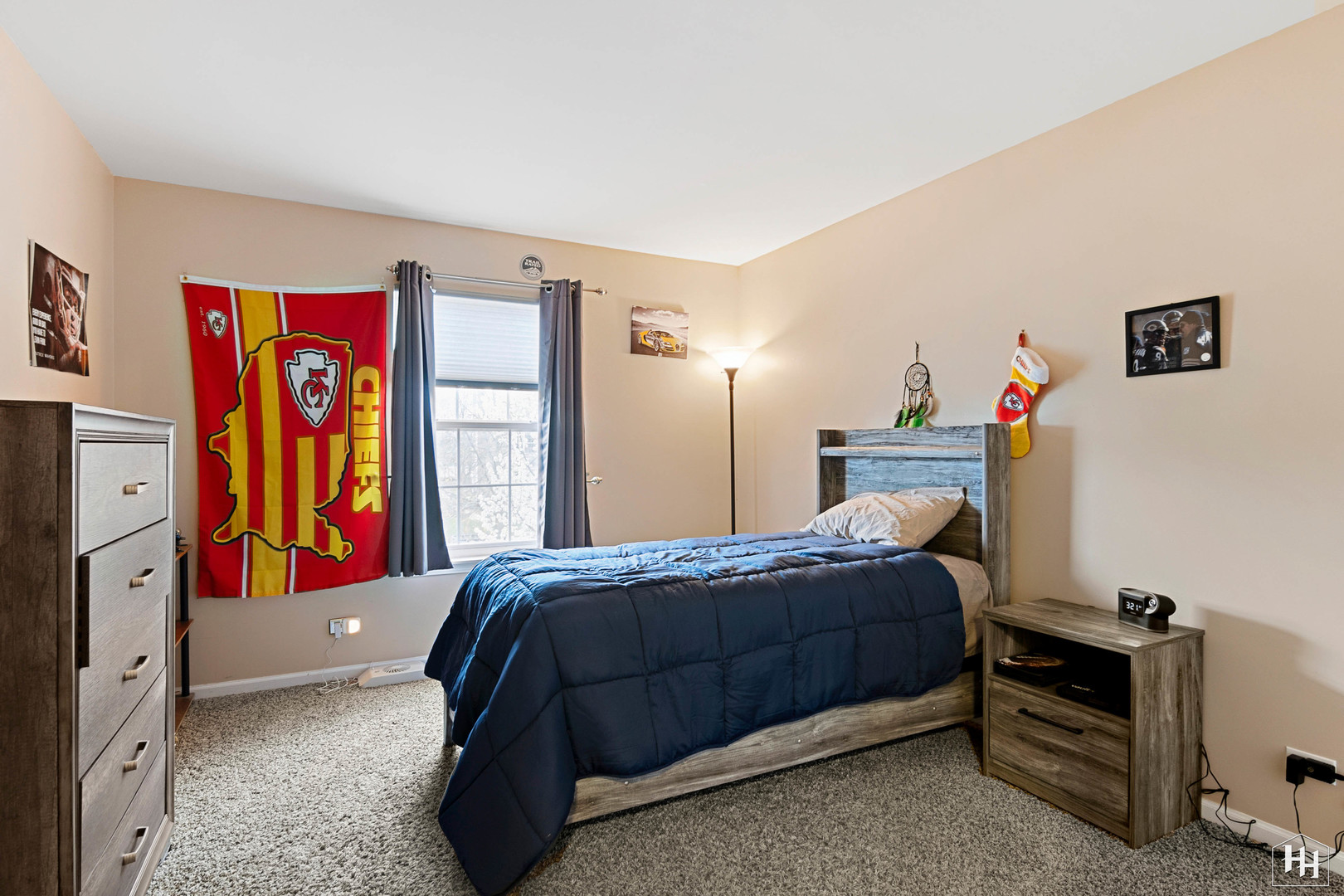1389 Collins Drive Cary, IL 60013 - Photo 26 of 39 a bedroom with a bed and a walk in closet