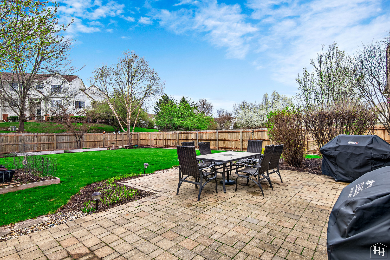 1389 Collins Drive Cary, IL 60013 - Photo 34 of 39 a view of a backyard with sitting area